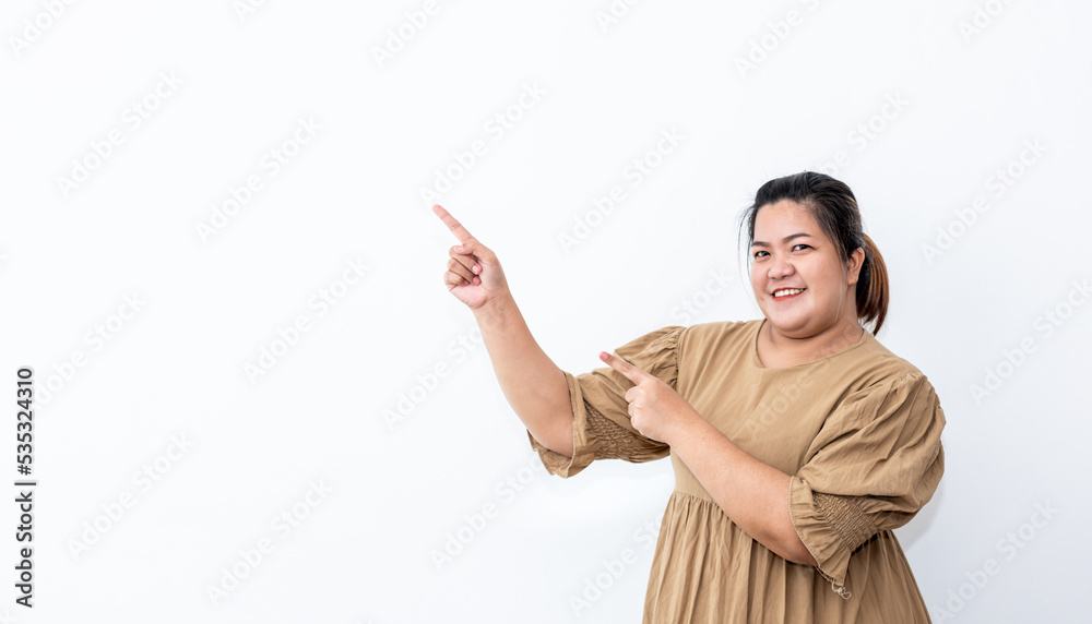 Portrait images of Asian fat woman She is smiling brightly, Show inviting gestures of advertisements, On white background, to people and advertising concept. Portrait images of Asian fat woman She is smiling brightly, Show inviting gestures of advertisements, On white background, to people and advertising concept.