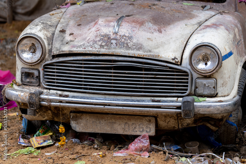 Abandoned car in the middle of the dirt. Pushkar, Rajasthan (India). Abandoned car in the middle of the dirt. Pushkar, Rajasthan (India).