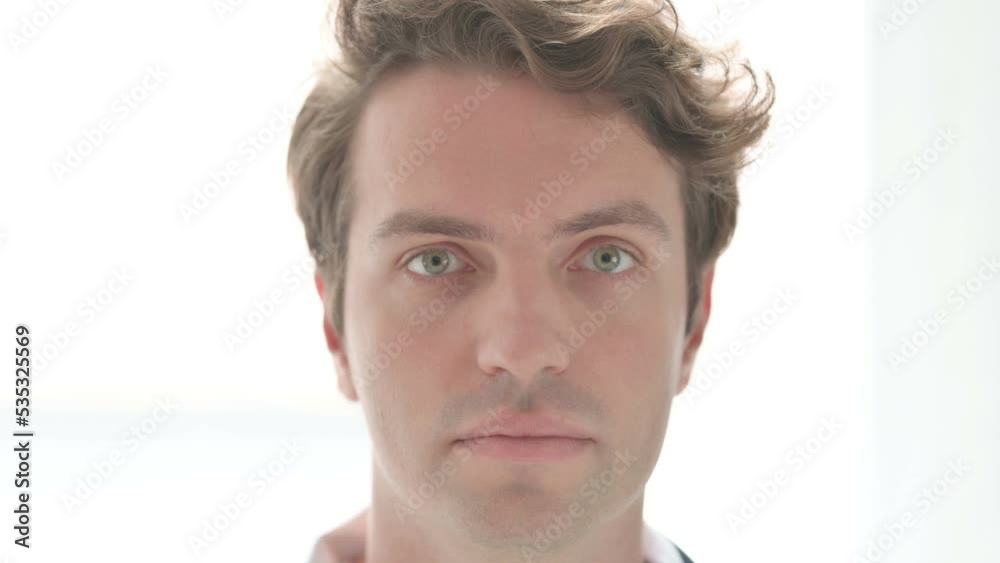 Face Close Up of Serious Young Man Face Close Up of Serious Young Man