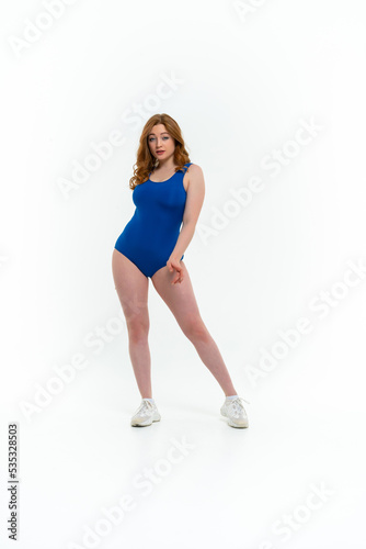 model size posing bodysuit on white background