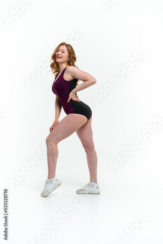 model size posing bodysuit on white background