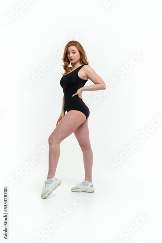 model size posing bodysuit on white background