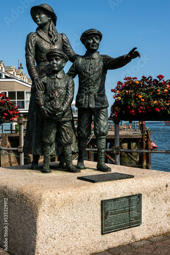  Annie Moore sculpture located in Cobh, County Cork. It commemorates Irish immigration to the United States 
 photo