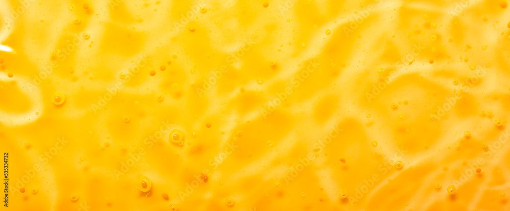 Cosmetic gel close-up with oxygen bubbles. Textured background with microbrushes in cosmetics. Moisturizing skin serum with vitamins and collagen. Cosmetic gel close-up with oxygen bubbles. Textured background with microbrushes in cosmetics. Moisturizing skin serum with vitamins and collagen.