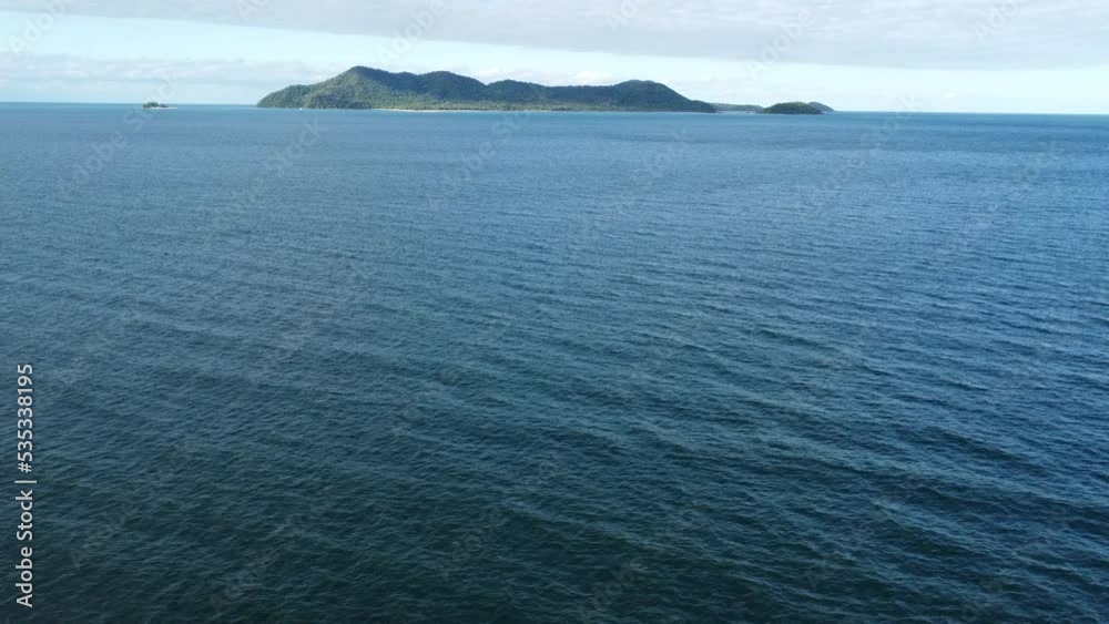 Aerial view over coral sea looking east to Dunk Island Aerial view over coral sea looking east to Dunk Island