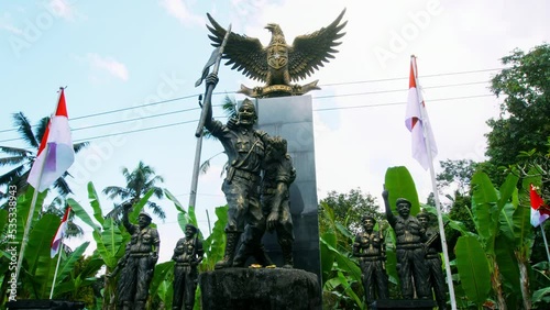 Statue of Indonesian military liberators with weapons photo