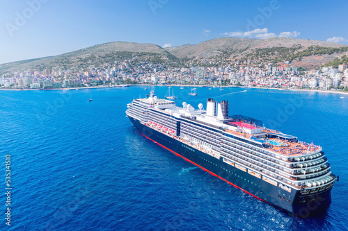 Cruise ship off the coast of Saranda. Albania. Promenade. City. View from a height