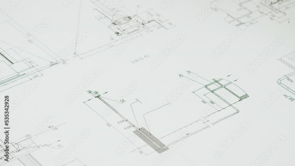 Architect designer drawing plan blueprint close-up. Professional engineer working, interior creator making architectural house project, drafting building. Architect designer drawing plan blueprint close-up. Professional engineer working, interior creator making architectural house project, drafting building.