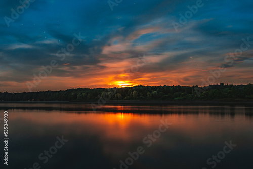sunset over the lake © Vasīlijs