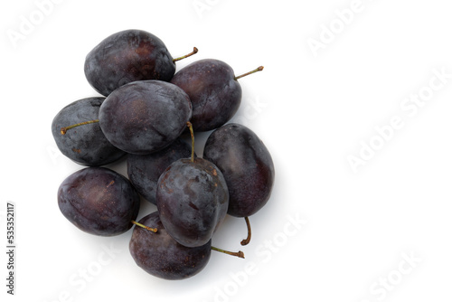 ripe plums isolated on white background, fresh fruits
