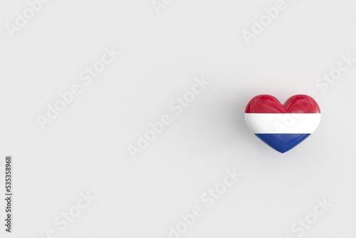 Love for the Netherlands - heart shaped glossy icon with the national flag of the Netherlands. Souvenir from the Netherlands as a symbol of pride in their country. 3D rendering, copy space