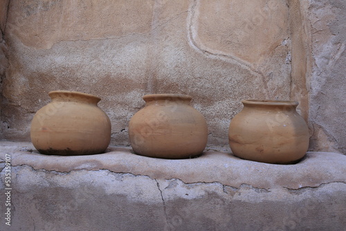 pots on a wall
