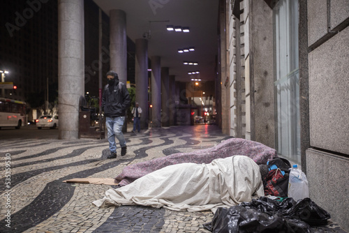 homeless people sleeping in the streets of rio de janeiro, brazil.