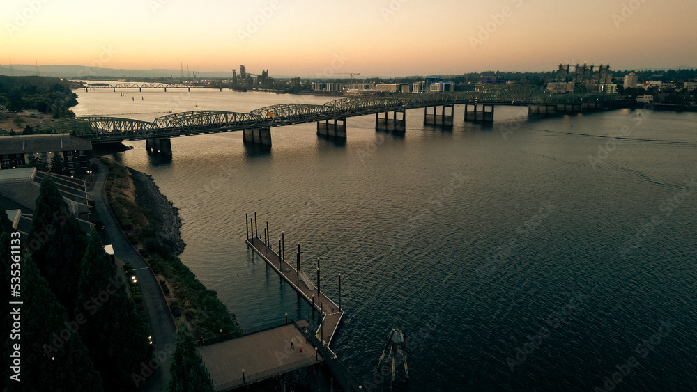 Fototapeta premium Drone footage of Oregon - Washington Interstate Bridge In Portland and Vancouver over the Columbia River water way