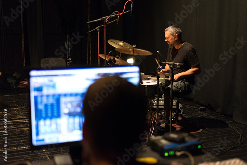 Canvas Print Drummer in rock band recording music in the professional recording studio