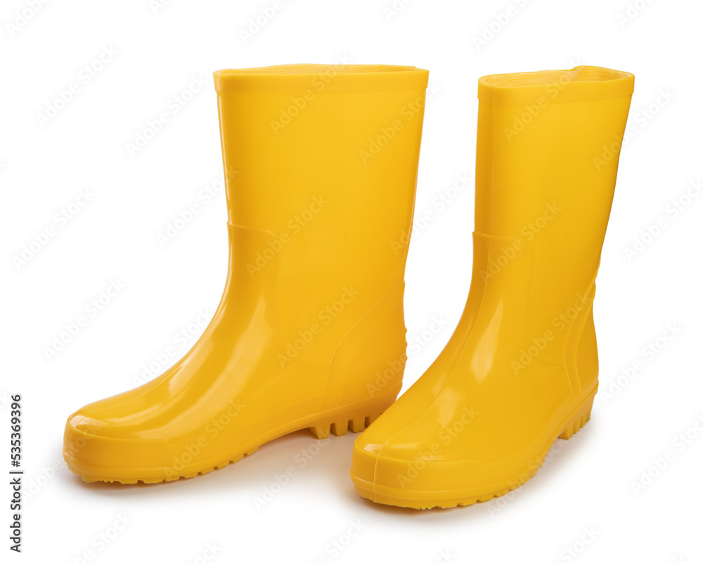 pair of waterproof yellow rubber boots for workers isolated on white background pair of waterproof yellow rubber boots for workers isolated on white background