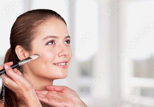 Daily Makeup. Smiling Young Female Applying  Makeup In Bathroom  Beautiful Happy Woman Using New Cosmetics