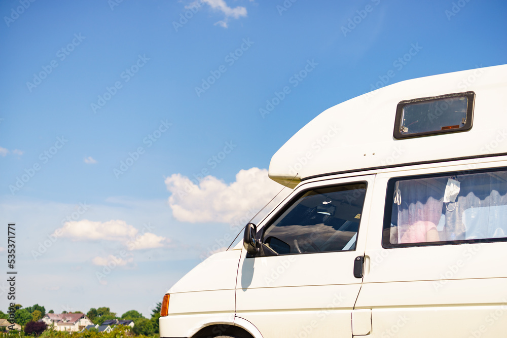 Naklejka premium Camper van camping on nature