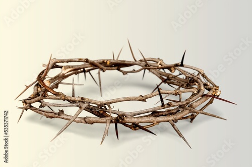 Crown of thorns symbolizing the sacrifice, suffering and resurrection of Jesus Christ on the cross and Easter bright background
