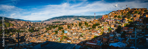 Fototapeta Naklejka Na Ścianę i Meble -  aerial panoramic view of Medellin Comuna 13 neighbourhood Colombia 