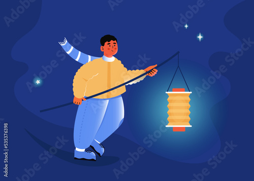  Lantern parade on Saint Martin's Day. Martinstag on 11 november. Boy with paper lantern. Laternelaufen. 