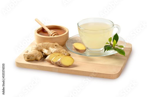 Cup of ginger tea ,ginger slices with honey in bowl and on white background. 