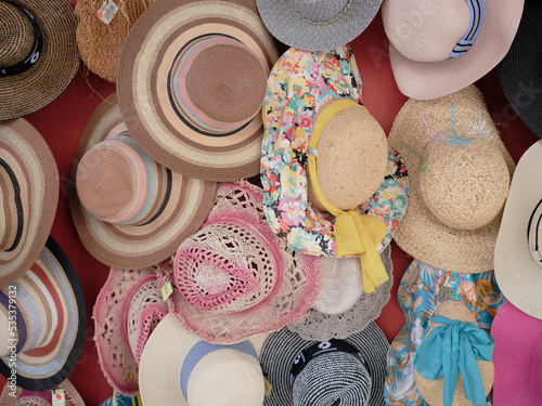 Straw hats sold at street retailer