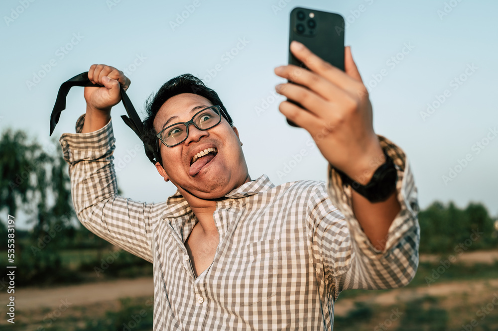Young funny businessman man in crazy and funny manner posture Young funny businessman man in crazy and funny manner posture