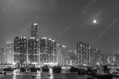 Night scenery of skyline and harbor of Hong Kong city
