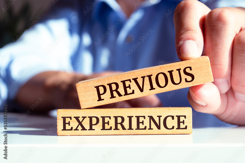 Wooden blocks with words 'PREVIOUS EXPERIENCE'. Business concept Wooden blocks with words 'PREVIOUS EXPERIENCE'. Business concept
