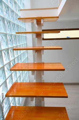 Fototapeta Naklejka Na Ścianę i Meble -  wooden staircase and glass wall, interior design