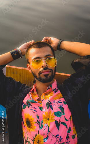 Wallpaper Mural Portrait of man wearing colorful shirt and sunglasses Torontodigital.ca