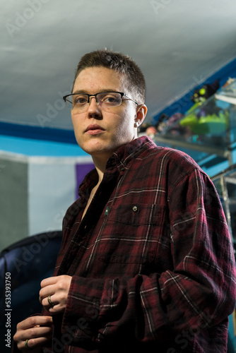 Portrait of young Brazilian transman indoor