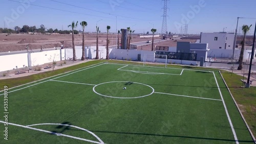 View of a drone ascending over a soccer field