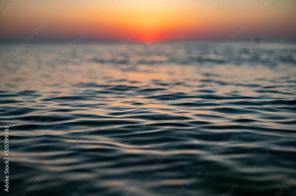 Obraz premium Close up of sea surface on sunset. Water background