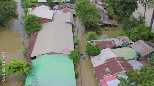 High-angle view of the Great Flood, Meng District, Thailand, on October 3, 2022, is a photograph from real flooding. With a slight color adjustment