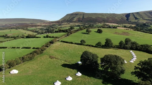 Aerial filming of luxury bell tents in Welsh Countryside. photo