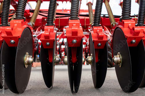 Precision seeder discs close-up for industrial design. Modern Modified Agricultural Seeder.