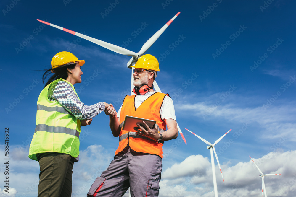 Windmill engineer inspection and progress check wind turbine at construction site Windmill engineer inspection and progress check wind turbine at construction site