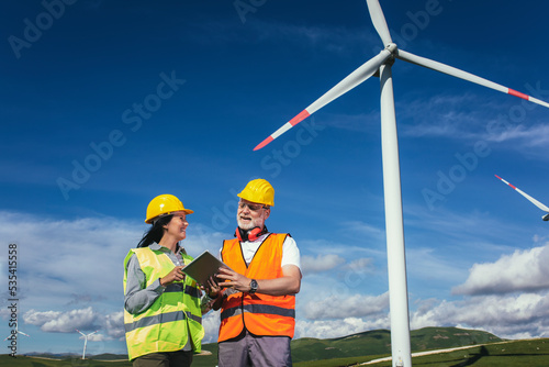 Windmill engineer inspection and progress check wind turbine at construction site