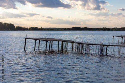 Wooden bridge leading to the lake.