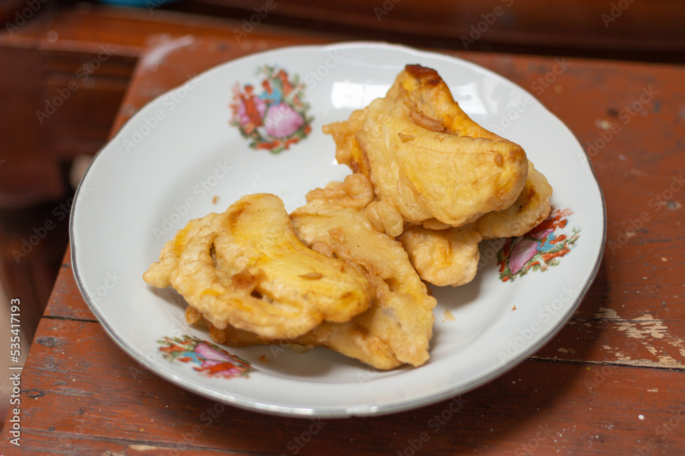 Fried bananas are still warm served on a plate Fried bananas are still warm served on a plate