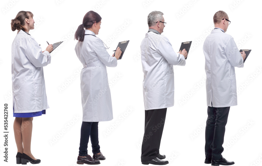 group of doctors standing with their backs isolated on white