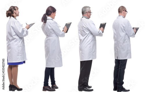 group of doctors standing with their backs isolated on white