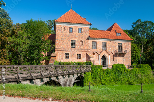 Oporowski Castle build in the Gothic style in the years 1434 - 1449. Oporow, Lodz Voivodeship, Poland photo