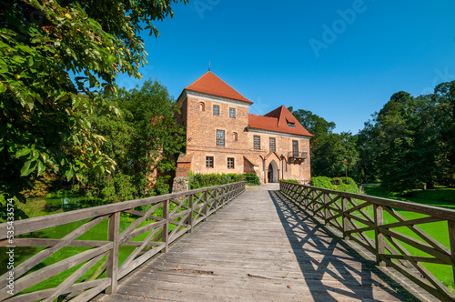Oporowski Castle build in the Gothic style in the years 1434 - 1449. Oporow, Lodz Voivodeship, Poland photo