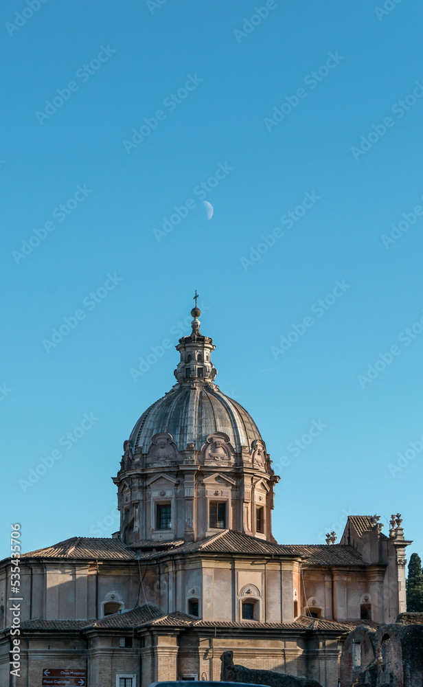 Church Dome in Rome with the moon