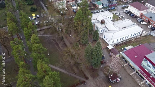 Goryachy Klyuch, Russia - February 26, 2022: Shooting from a quadrocopter in the central part of the city. Foothills of the Caucasus. A cloudy winter day in a southern city. photo