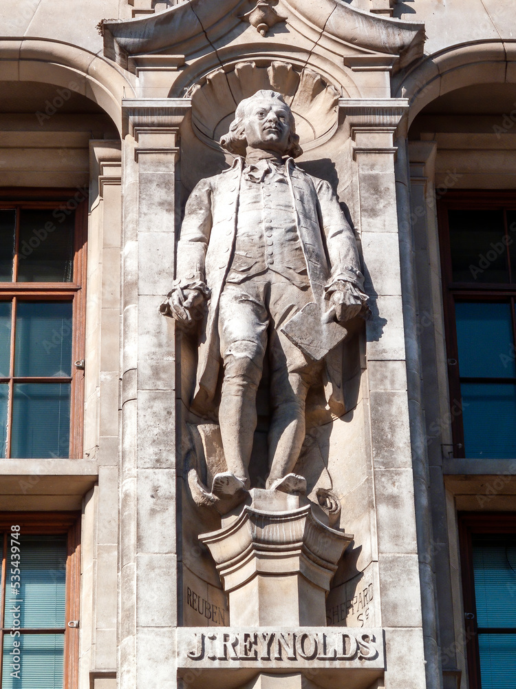 Sir Joshua Reynolds sculpture statue on the exterior of the Natural History Museum in London England UK who was a leading portrait painter artist of the 18th century, stock photo image