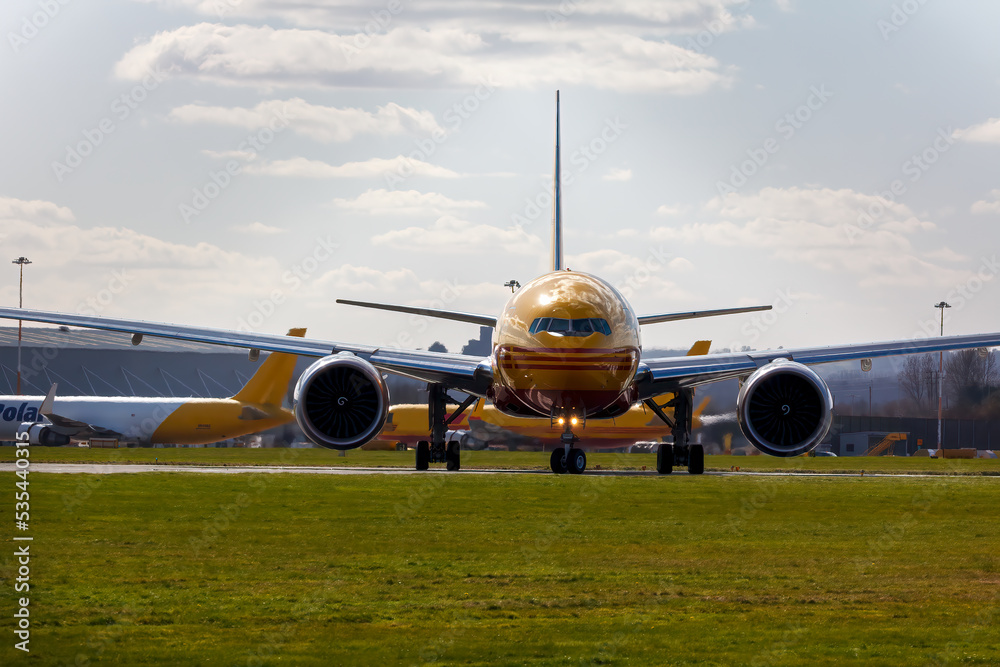 Naklejka premium G-DHLY a 777 taxing out for take off at EMA - stock photo.jpg